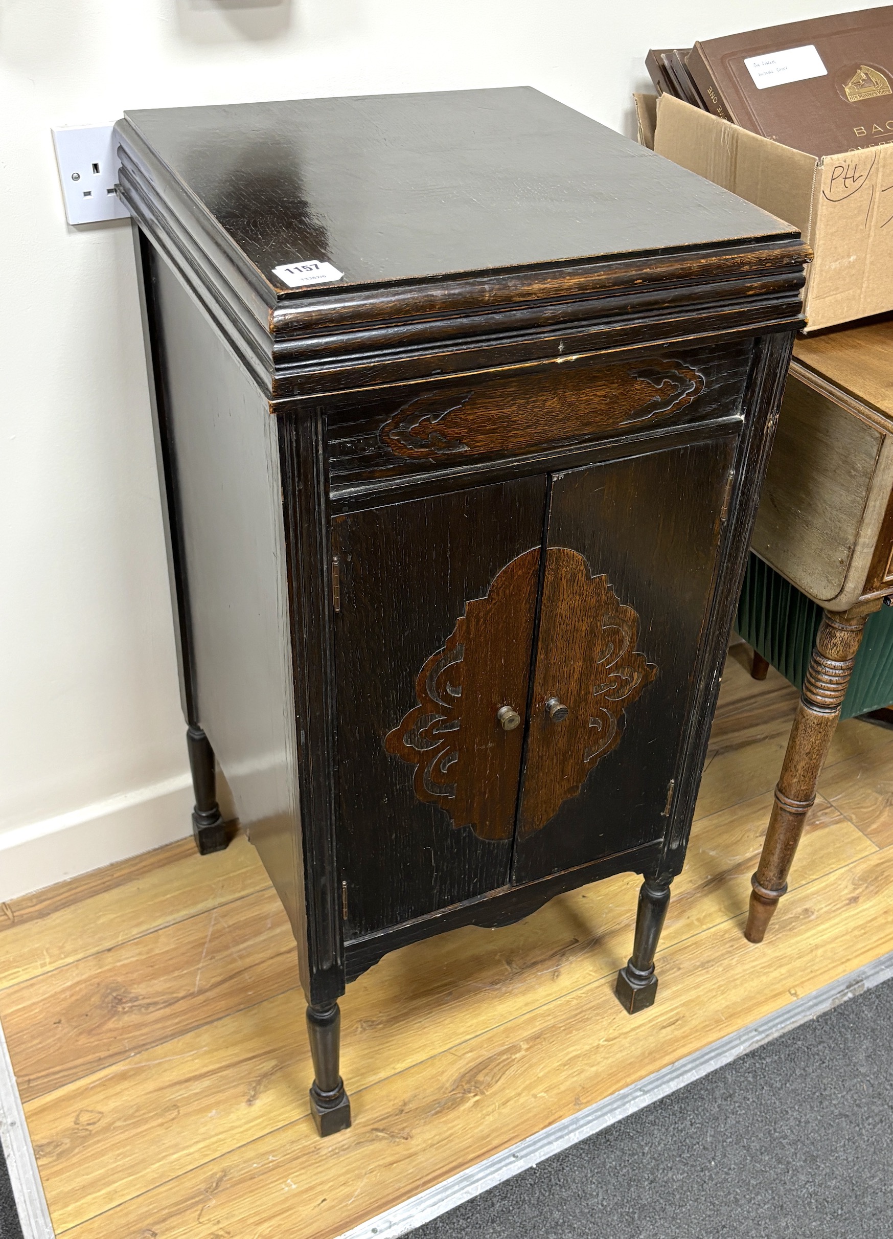 An early 20th century Fullotone oak cased wind-up gramophone, width 43cm, depth 48cm, height 93cm together with a small collection of records